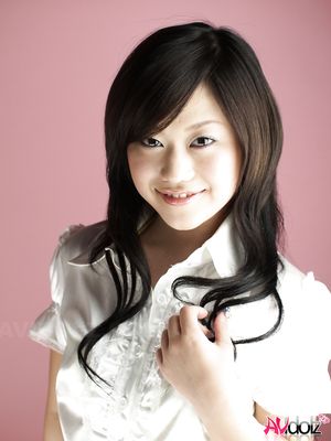 Minako Oyama looks so cute in black and white outfit for these photos.