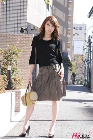 Gorgeous Mika Ito changes outfits for posing in different places.