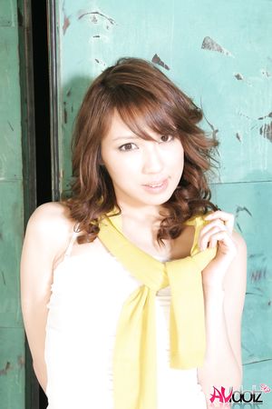 Mika Ito spreads legs and shows shaved cunt at a photo shooting.