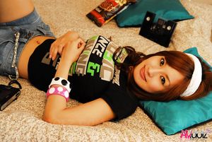 Superb Mecumi takes her clothes off while playing so nasty in bed.