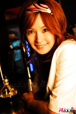 Mecumi is so beautiful relaxing at the bar in her casual outfit.