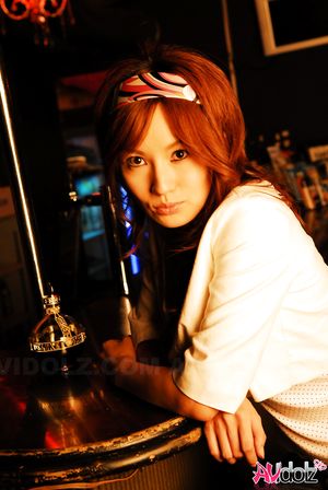 Mecumi is so beautiful relaxing at the bar in her casual outfit.