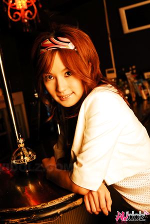 Mecumi is so beautiful relaxing at the bar in her casual outfit.