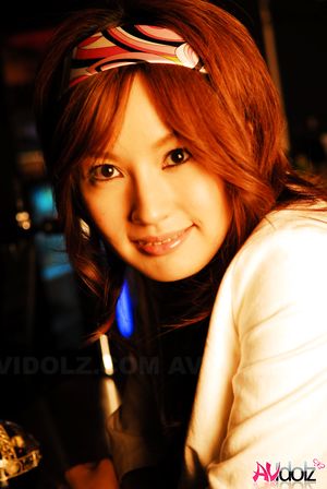 Mecumi is so beautiful relaxing at the bar in her casual outfit.