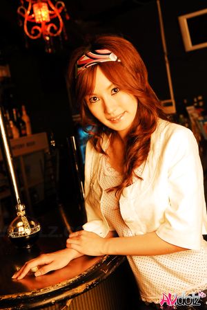 Mecumi is so beautiful relaxing at the bar in her casual outfit.