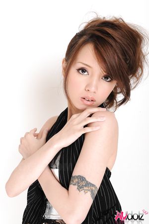 Lina Aishima strips to expose her sexy body in such a hot photo shoot.