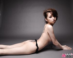 Lina Aishima strips to expose her sexy body in such a hot photo shoot.