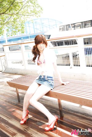 Asian Anna Watanabe takes a walk to expose her sexy legs in shorts.