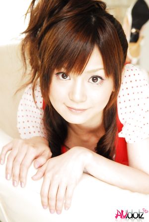 Anna Watanabe exposes her hot body in short pants and red blouse.