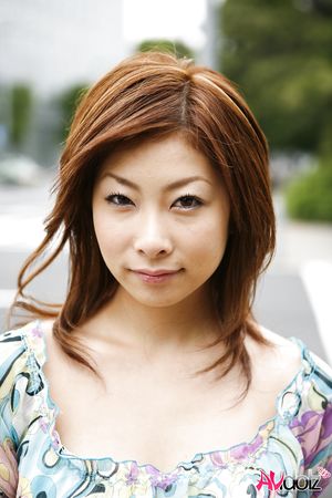 Keiko Morikawa is happy to pose outdoor, smiling and being so natural.