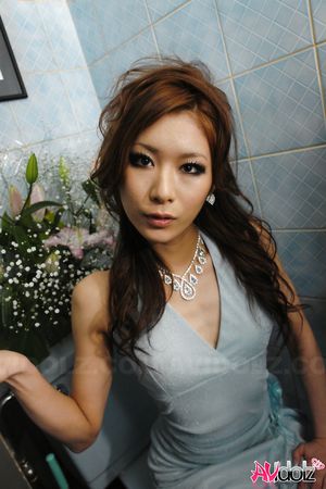 Hot Erena in elegant dress sucks cock and gets cum in her palms.