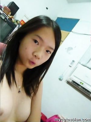 Asian teen shows off small tits n shaved pussy in really hot selfshot naked pics