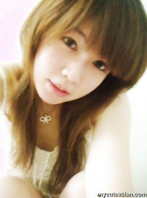 Selfmade photos of Busty and Gorgeous Asian girlfriend at home