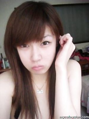 Selfmade photos of Busty and Gorgeous Asian girlfriend at home