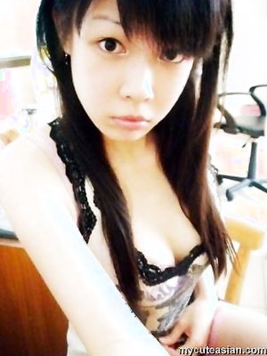 Selfmade photos of Busty and Gorgeous Asian girlfriend at home