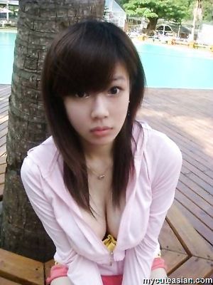 Selfmade photos of Busty and Gorgeous Asian girlfriend at home