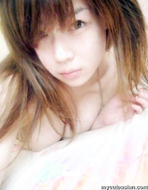 Selfmade photos of Busty and Gorgeous Asian girlfriend at home