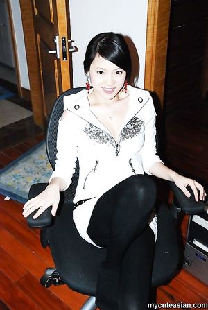 Homemade photos of cute Asian girlfriend posing for the camera