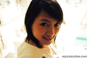Homemade photos of cute Asian girlfriend posing for the camera