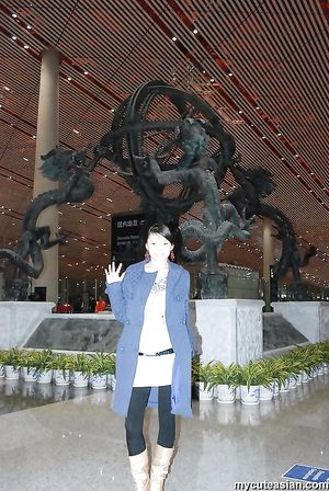 Homemade photos of cute Asian girlfriend posing for the camera