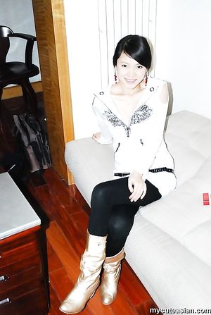 Homemade photos of cute Asian girlfriend posing for the camera