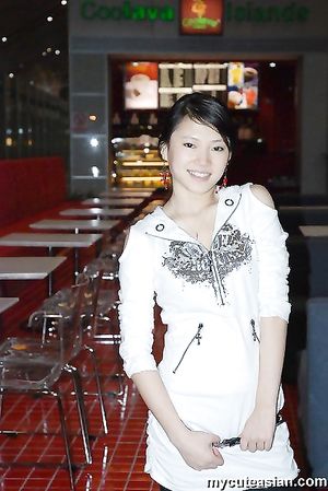 Homemade photos of cute Asian girlfriend posing for the camera