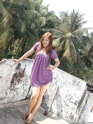 Lovely Asian amateur teen teasing us in front of her house