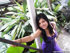 Lovely Asian amateur teen teasing us in front of her house