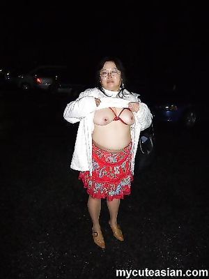 Asian mature amateur housewife shows her big natural tits and older pussy