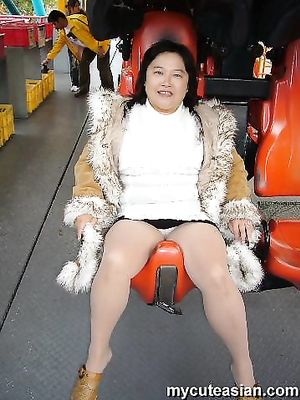 Asian mature amateur housewife shows her big natural tits and older pussy