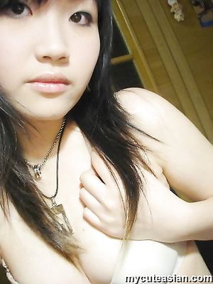 Lovely Asian teen is sharing some homemade naked pix here