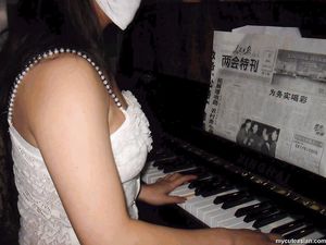 Sexy Asian Amateur wife poses and shows her big boobs at home