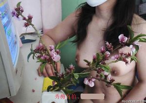 Sexy Asian Amateur wife poses and shows her big boobs at home