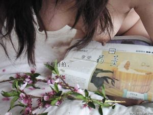 Sexy Asian Amateur wife poses and shows her big boobs at home