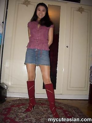 Hot asian girlfriend posing in miniskirt then sucks a hard cock