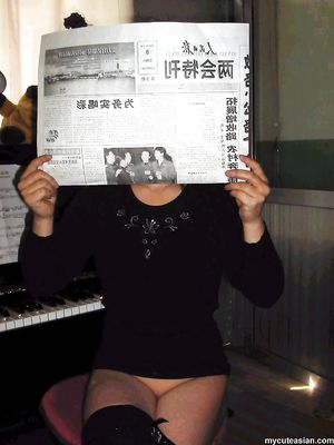 Busty and masked Chinese asian amateur posing nude at home