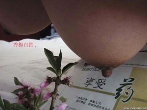 Busty and masked Chinese asian amateur posing nude at home