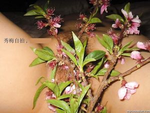 Busty and masked Chinese asian amateur posing nude at home