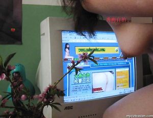 Busty and masked Chinese asian amateur posing nude at home