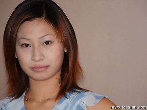 Lovely chinese amateur teen in sexy lingerie is posing at home