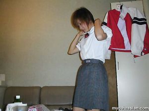 Cute japanese amateur coed in uniform strips and sucks a cock hard