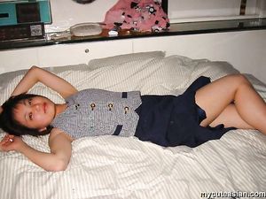 Cute japanese amateur coed in uniform strips and sucks a cock hard