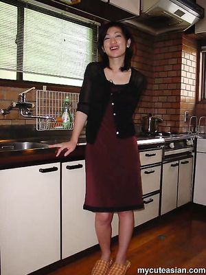 Sexy japanese wife strips and shows her nice mature body here
