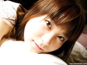 Cute young japanese coed in uniform gets her tight pussy banged from behind