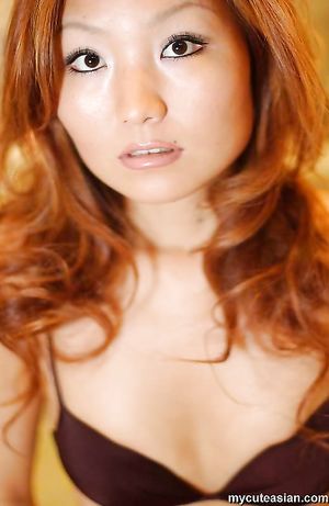 Horny japanese babe with long hair showing her tight pussy and posing