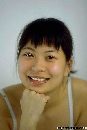 Sweet asian amateur teen with small breats spreads her tight virgin pussy