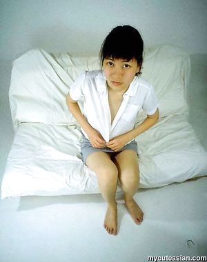 Sweet asian amateur teen with small breats spreads her tight virgin pussy