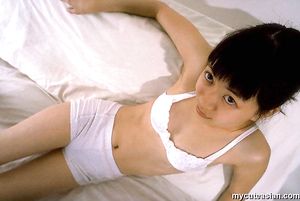Sweet asian amateur teen with small breats spreads her tight virgin pussy