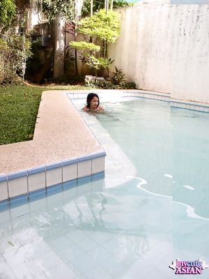 Lovely shaved Filipino teen sucks her boyfriend cock in swimming pool