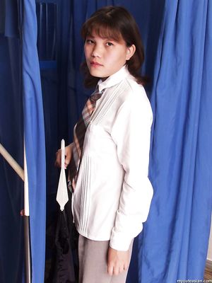 Sexy asian girlfriend in sexy lingerie stripping in changing room